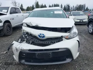 2015 Toyota Prius Two with VIN JTDZN3EU7FJ040438, listed as a IAAI auction lot 41641753 with 57,727 mi miles and . Bid and sale history available at DreamBid. Image 13.