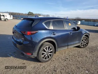 2018 Mazda CX-5 Touring with VIN JM3KFACM4J0470374, listed as a Copart auction lot 43048035 with 125,440 mi miles and Salvage Title. Bid and sale history available at carsss.com. Image 3.