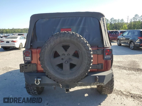 2008 Jeep Wrangler Sahara z VIN 1J4FA54148L610723, wystawiony jako Copart lot #52085525 z przebiegiem 158 057 mil mil oraz Czysty tytuł • Clean title. Historia ofert i sprzedaży dostępna na DreamBid. Obrazek 6.