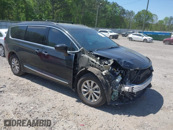 2017 Chrysler Pacifica Touring L with VIN 2C4RC1BG7HR539716, listed as a IAAI auction lot 42037822 with 160,623 mi miles and . Bid and sale history available at DreamBid. Image 1.