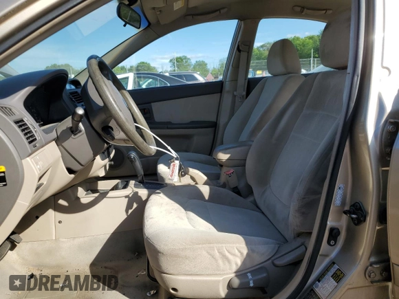 2006 Kia Spectra EX z VIN KNAFE121365269433, wystawiony jako Copart lot #56634735 z przebiegiem 86 551 mil mil oraz Szkoda całkowita • Salvage title. Historia ofert i sprzedaży dostępna na DreamBid. Obrazek 7.