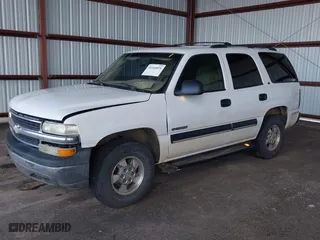 2001 Chevrolet Tahoe LS with VIN 1GNEK13T91R115616, listed as a IAAI auction lot 40104825 with 245,782 mi miles. Bid and sale history available at carsss.com. Image 2.