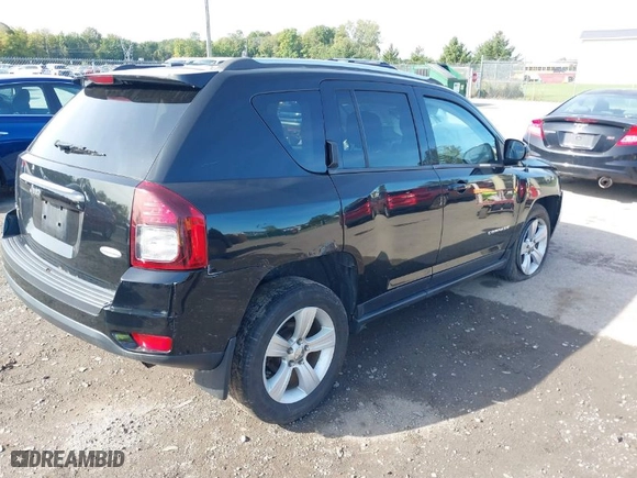 2014 Jeep Compass Latitude with VIN 1C4NJDEB0ED622084, listed as a IAAI auction lot 40412845 with 191,571 mi miles. Bid and sale history available at carsss.com. Image 4.