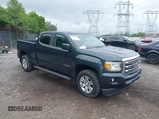 2017 GMC Canyon 4WD SLE z VIN 1GTG6CEN8H1265791, wystawiony jako IAAI lot #42324076 z przebiegiem 81 587 mil mil oraz . Historia ofert i sprzedaży dostępna na DreamBid. Obrazek 1.