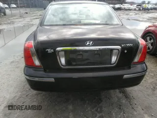 2005 Hyundai XG350 with VIN KMHFU45EX5A420629, listed as a IAAI auction lot 40793422 with 211,598 mi miles. Bid and sale history available at carsss.com. Image 6.