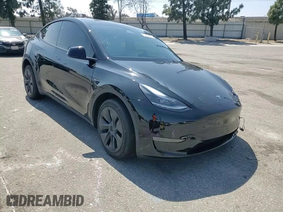 2024 Tesla Model Y z VIN 7SAYGDED8RF123516, wystawiony jako Copart lot #55354655 z przebiegiem 12 521 mil mil oraz Szkoda całkowita • Salvage title. Historia ofert i sprzedaży dostępna na DreamBid. Obrazek 14.