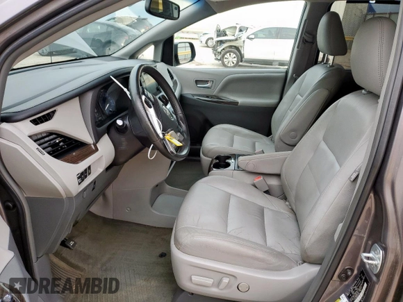 2016 Toyota Sienna XLE with VIN 5TDYK3DC9GS743458, listed as a Copart auction lot 60264865 with 65,272 mi miles and Salvage title. Bid and sale history available at DreamBid. Image 7.