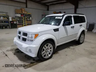 2011 Dodge Nitro Heat with VIN 1D4PU4GX7BW607335, listed as a Copart auction lot 59881235 with 152,891 mi miles and Salvage title. Bid and sale history available at DreamBid. Image 1.