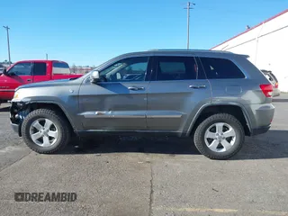 2011 Jeep Grand Cherokee Laredo with VIN 1J4RR4GG9BC714325, listed as a IAAI auction lot 41560915 with 153,372 mi miles and . Bid and sale history available at DreamBid. Image 14.