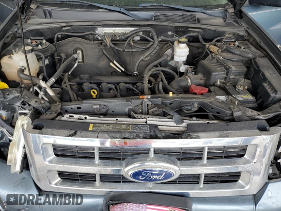 2012 Ford Escape XLS with VIN 1FMCU0C71CKA64501, listed as a Copart auction lot 59606245 with 112,112 mi miles and Salvage title. Bid and sale history available at DreamBid. Image 12.