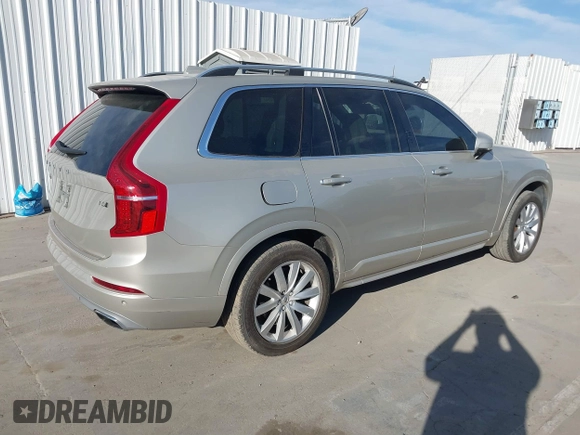 2016 Volvo XC90 T6 Momentum with VIN YV4A22PK5G1071505, listed as a IAAI auction lot 41702501 with 154,679 mi miles. Bid and sale history available at carsss.com. Image 4.