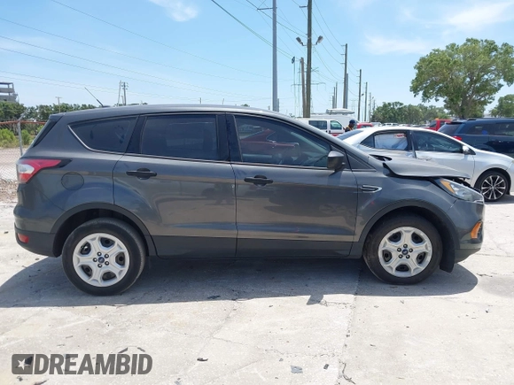2018 Ford Escape S with VIN 1FMCU0F7XJUA16377, listed as a IAAI auction lot 42080136 with 81,060 mi miles and . Bid and sale history available at carsss.com. Image 14.