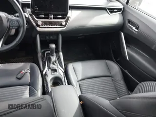 2023 Toyota Corolla Cross Hybrid S with VIN 7MUFBABG1PV005094, listed as a IAAI auction lot 42162727 with Not provided miles and . Bid and sale history available at DreamBid. Image 15.