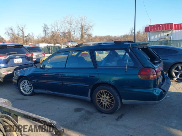 1998 Subaru Legacy GT with VIN 4S3BK6757W6306738, listed as a IAAI auction lot 41267382 with 291,068 mi miles and . Bid and sale history available at DreamBid. Image 14.