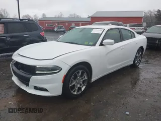 2015 Dodge Charger SXT with VIN 2C3CDXJG3FH746506, listed as a IAAI auction lot 41463713 with 130,687 mi miles. Bid and sale history available at carsss.com. Image 2.