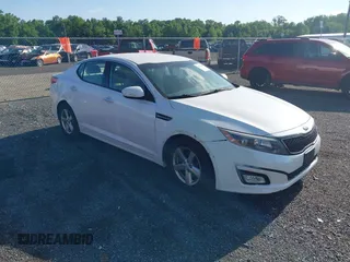 2015 Kia Optima LX z VIN KNAGM4A7XF5641123, wystawiony jako IAAI lot #42290886 z przebiegiem 90 358 mil mil oraz . Historia ofert i sprzedaży dostępna na DreamBid. Obrazek 1.