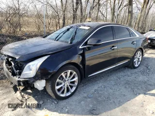 2013 Cadillac XTS Luxury with VIN 2G61R5S36D9141006, listed as a Copart auction lot 49471675 with 99,989 mi miles and Salvage Title. Bid and sale history available at carsss.com. Image 1.