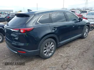 2020 Mazda CX-9 Grand Touring with VIN JM3TCBDY3L0419049, listed as a IAAI auction lot 41948393 with 70,163 mi miles and . Bid and sale history available at DreamBid. Image 4.