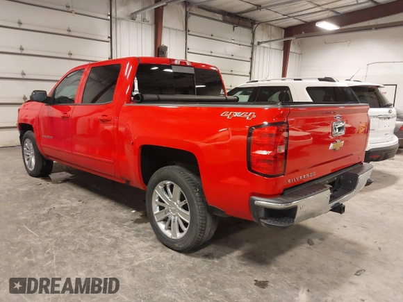 2017 Chevrolet Silverado 1500 LT with VIN 3GCUKREC9HG458520, listed as a IAAI auction lot 41364459 with 130,130 mi miles and . Bid and sale history available at DreamBid. Image 3.