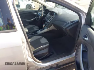 2012 Ford Focus SE z VIN 1FAHP3F28CL215997, wystawiony jako IAAI lot #42483639 z przebiegiem 101 518 mil mil oraz . Historia ofert i sprzedaży dostępna na DreamBid. Obrazek 5.