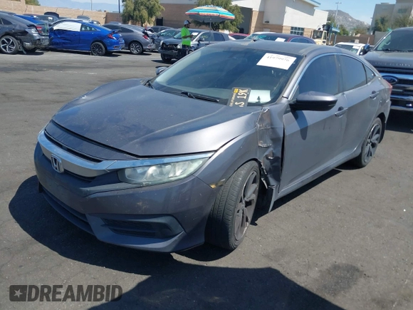 2018 Honda Civic LX with VIN 2HGFC2F57JH546731, listed as a IAAI auction lot 41979976 with 137,531 mi miles. Bid and sale history available at carsss.com. Image 18.