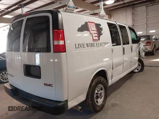 2020 GMC Savana Cargo Van with VIN 1GTW7AFP2L1273696, listed as a IAAI auction lot 41260652 with 73,307 mi miles. Bid and sale history available at carsss.com. Image 4.