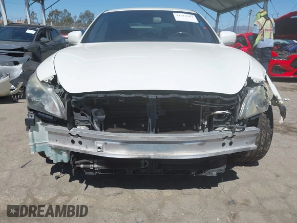 2013 Infiniti M with VIN JN1BY1AP6DM511104, listed as a IAAI auction lot 41818184 with 138,605 mi miles and . Bid and sale history available at DreamBid. Image 6.