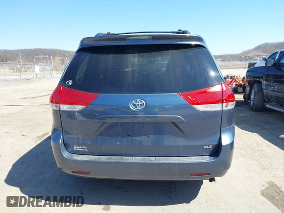 2013 Toyota Sienna XLE AAS with VIN 5TDYK3DC0DS398381, listed as a IAAI auction lot 41773688 with 169,055 mi miles. Bid and sale history available at carsss.com. Image 16.