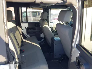 2008 Jeep Wrangler Unlimited Rubicon with VIN 1J4GA69198L615547, listed as a IAAI auction lot 41351138 with 213,487 mi miles and . Bid and sale history available at DreamBid. Image 8.