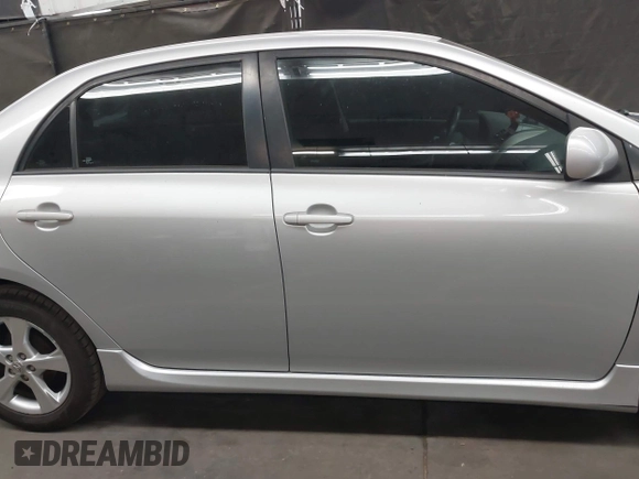 2013 Toyota Corolla L with VIN 5YFBU4EE5DP123569, listed as a IAAI auction lot 42012861 with 129,381 mi miles and . Bid and sale history available at DreamBid. Image 13.
