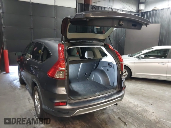 2015 Honda CR-V EX with VIN 2HKRM4H58FH619184, listed as a IAAI auction lot 42021030 with 102,948 mi miles and . Bid and sale history available at DreamBid. Image 3.