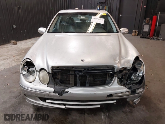 2003 Mercedes-Benz E 500 with VIN WDBUF70J03A101277, listed as a IAAI auction lot 40872555 with 330,553 mi miles and . Bid and sale history available at DreamBid. Image 13.
