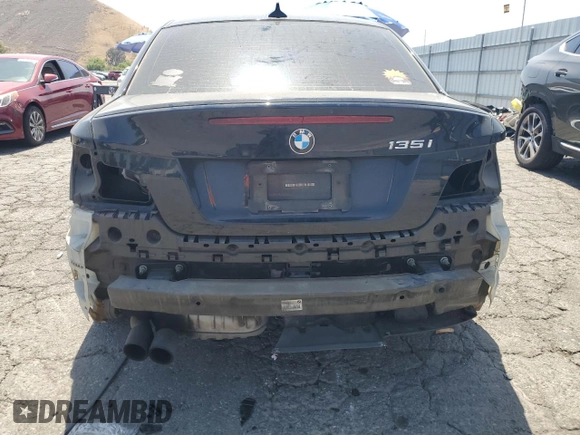 2011 BMW 1 Series 135i with VIN WBAUC9C59BVM10528, listed as a Copart auction lot 61499025 with 160,557 mi miles and Salvage title. Bid and sale history available at DreamBid. Image 6.