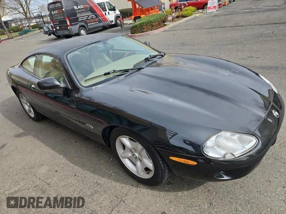 1997 Jaguar XK with VIN SAJGX5747VC007213, listed as a Copart auction lot 45953175 with 82,461 mi miles and Clean Title. Bid and sale history available at DreamBid. Image 1.