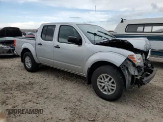 2018 Nissan Frontier Pro-4X with VIN 1N6AD0EV3JN730256, listed as a Copart auction lot 54273825 with 55,363 mi miles and Salvage title. Bid and sale history available at DreamBid. Image 4.