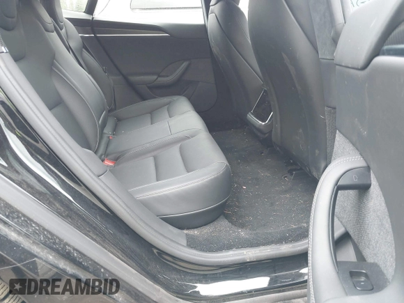 2021 Tesla Model S Plaid with VIN 5YJSA1E62MF447509, listed as a IAAI auction lot 42509281 with 32,372 mi miles and . Bid and sale history available at DreamBid. Image 8.