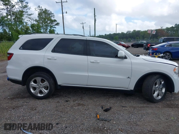 2015 Dodge Durango Limited with VIN 1C4RDJDGXFC947109, listed as a IAAI auction lot 39715331 with 152,655 mi miles and . Bid and sale history available at carsss.com. Image 13.