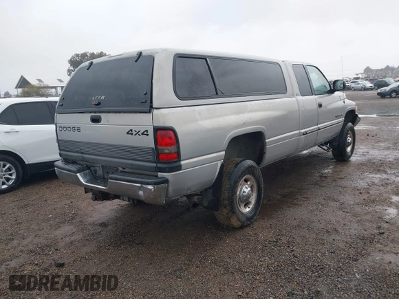 2000 Dodge Ram 2500 with VIN 1B7KF23W0YJ126951, listed as a IAAI auction lot 41802970 with 179,644 mi miles. Bid and sale history available at carsss.com. Image 4.