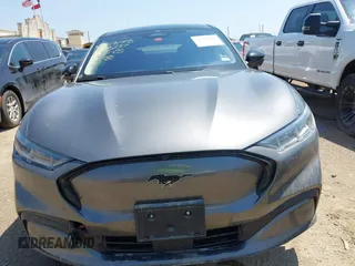 2023 Ford Mustang Mach-E Premium z VIN 3FMTK3SU3PMA83287, wystawiony jako IAAI lot #42329691 z przebiegiem Nie podano mil oraz . Historia ofert i sprzedaży dostępna na DreamBid. Obrazek 11.