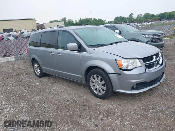 2018 Dodge Grand Caravan SXT z VIN 2C4RDGCG7JR301434, wystawiony jako IAAI lot #42510771 z przebiegiem 270 524 mil mil oraz . Historia ofert i sprzedaży dostępna na DreamBid. Obrazek 1.