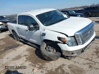 2017 Nissan Titan SL with VIN 1N6AA1E64HN565318, listed as a IAAI auction lot 41322120 with 114,515 mi miles and . Bid and sale history available at DreamBid. Image 1.