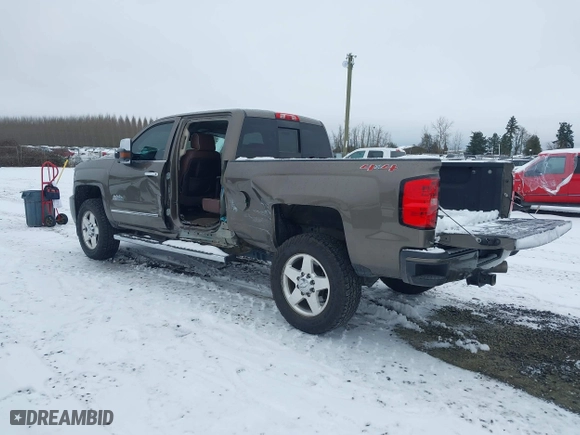 2015 Chevrolet Silverado 2500HD Built After Aug 14 High Country with VIN 1GC1KXE89FF543780, listed as a IAAI auction lot 41557608 with 164,171 mi miles. Bid and sale history available at carsss.com. Image 3.