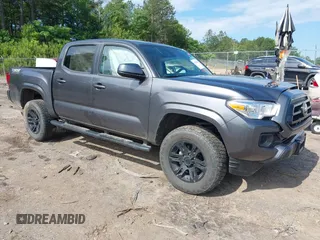 2022 Toyota Tacoma SR with VIN 3TYAX5GN5NT046897, listed as a IAAI auction lot 42253604 with 69,246 mi miles and . Bid and sale history available at DreamBid. Image 1.