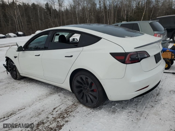 2022 Tesla Model 3 Performance with VIN 5YJ3E1EC3NF121198, listed as a Copart auction lot 88000365 with 87,626 mi miles and Salvage Title. Bid and sale history available at carsss.com. Image 2.