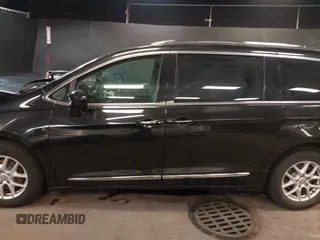2020 Chrysler Pacifica Touring L with VIN 2C4RC1BG2LR280156, listed as a IAAI auction lot 42182406 with 105,038 mi miles and . Bid and sale history available at DreamBid. Image 14.