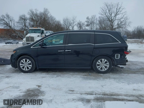 2015 Honda Odyssey EX-L with VIN 5FNRL5H60FB018030, listed as a IAAI auction lot 41608357 with 166,214 mi miles and . Bid and sale history available at carsss.com. Image 14.