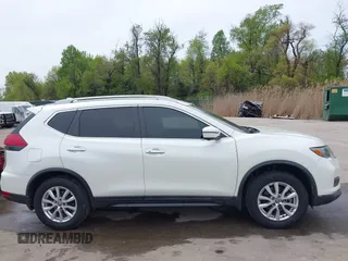 2017 Nissan Rogue S with VIN 5N1AT2MM3HC794051, listed as a IAAI auction lot 42063921 with 129,586 mi miles and . Bid and sale history available at DreamBid. Image 13.