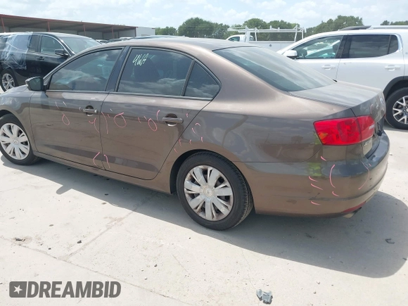 2012 Volkswagen Jetta SE with VIN 3VWDX7AJ3CM121987, listed as a IAAI auction lot 42520818 with 149,997 mi miles and . Bid and sale history available at DreamBid. Image 3.