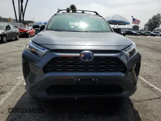 2024 Toyota RAV4 Hybrid LE with VIN JTMMWRFV7RD233242, listed as a Copart auction lot 60878815 with 11,064 mi miles and Salvage title. Bid and sale history available at DreamBid. Image 5.