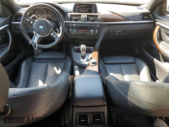 2015 BMW 4 Series 428i xDrive with VIN WBA4A7C58FD413734, listed as a Copart auction lot 50252325 with 74,629 mi miles and Salvage title. Bid and sale history available at DreamBid. Image 8.